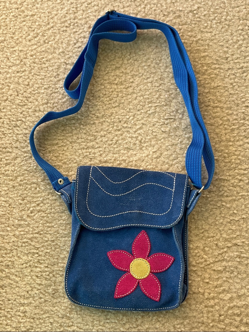 Blue Suede Crossbody Bag with Pink Flower Accent